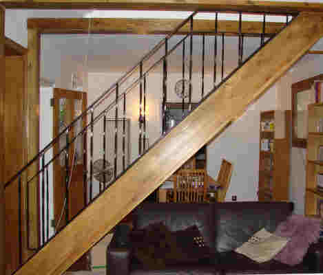 wrought iron railing for stairs in surrey, epsom, fitted to wooden stair case