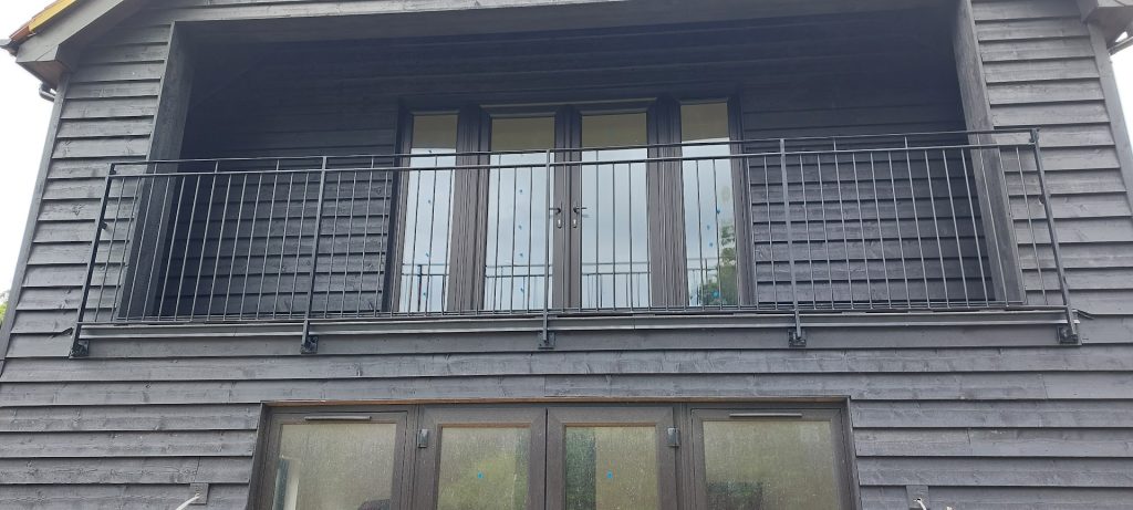 Large custom made Metal Juliet balcony railing in Copthorne